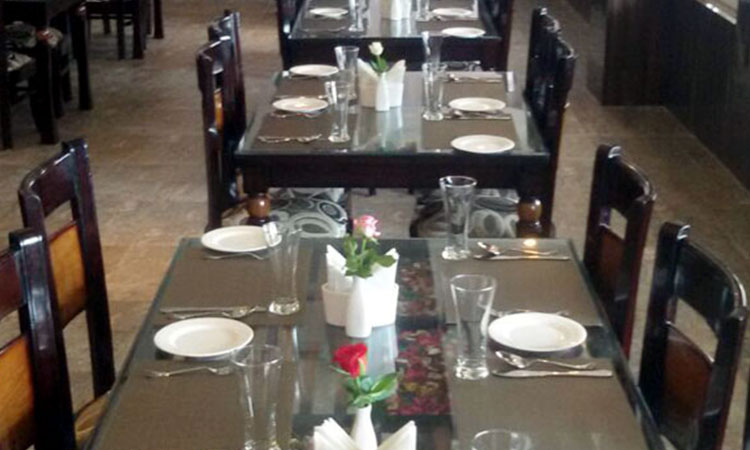 Om Leisure Resort Puri - Restaurant Table Decoration