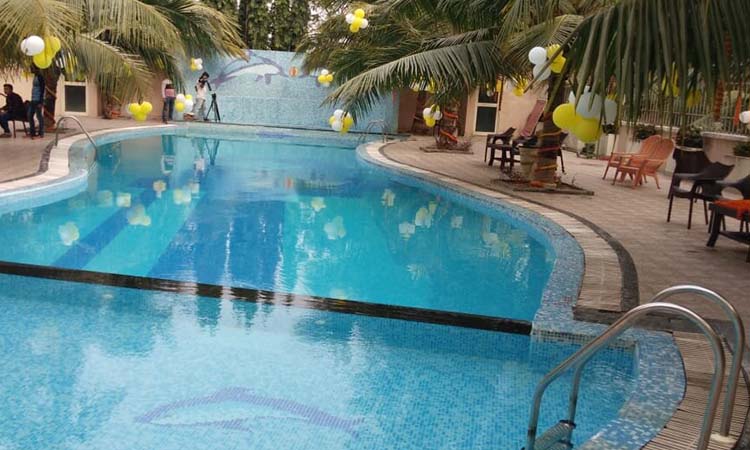 Om Leisure Resort Puri - Decorated Swimming Pool